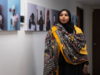 Safiyo Jama, a San Diego resident from Somalia, at the Partnership for the Advancement of New Americans office in San Diego on Feb. 15, 2024. Jama, who volunteers for PANA, has voted in U.S. elections since 2010 and helps other Somali residents understand election materials. The organization conducted outreach and held community meetings regarding AB 884, which would expand language access in election materials. Photo by Adriana Heldiz, CalMatters
